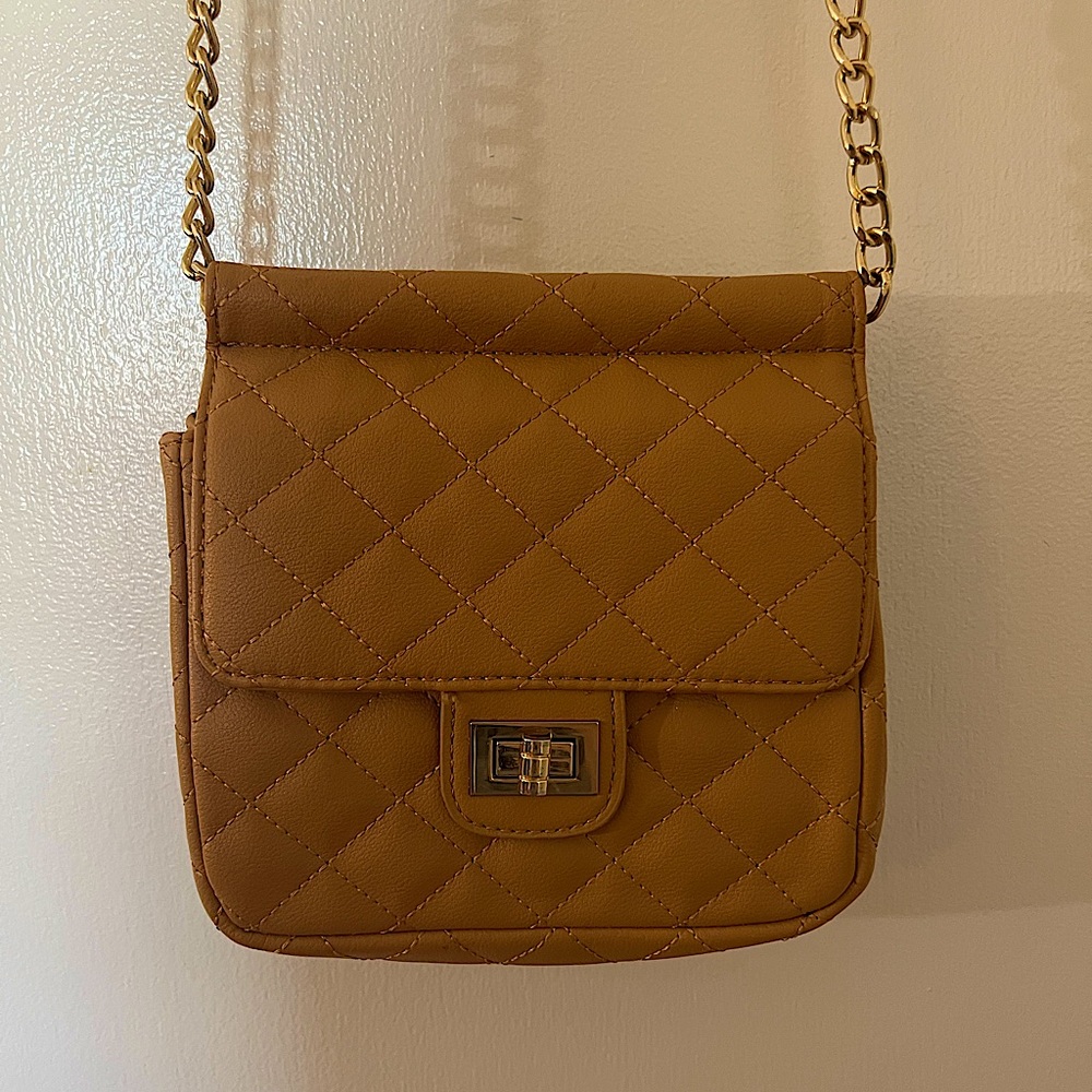 Camel colored quilted crossbody bag with gold hardware